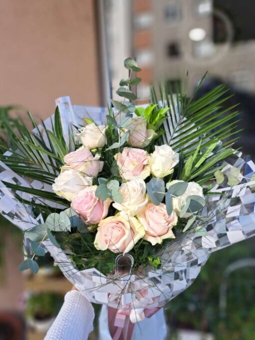 A bouquet of 11 roses, beautifully wrapped
