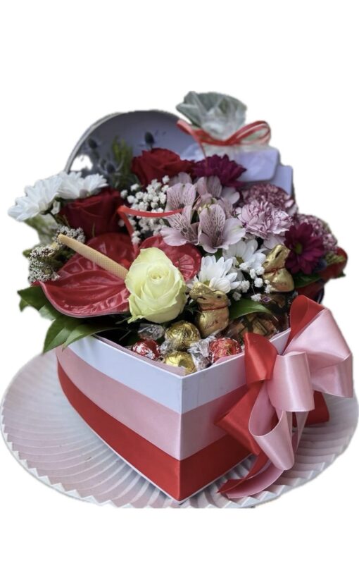 A floral arrangement with sweets