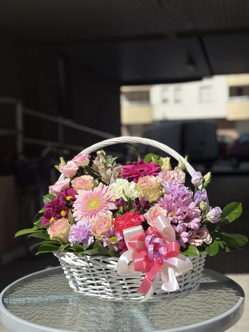 Basket with colourful flowers