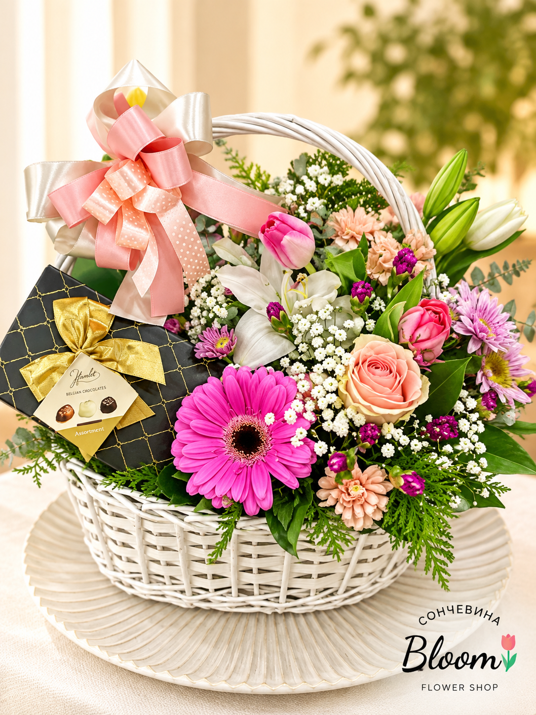 A big colorful floral arrangement with sweets